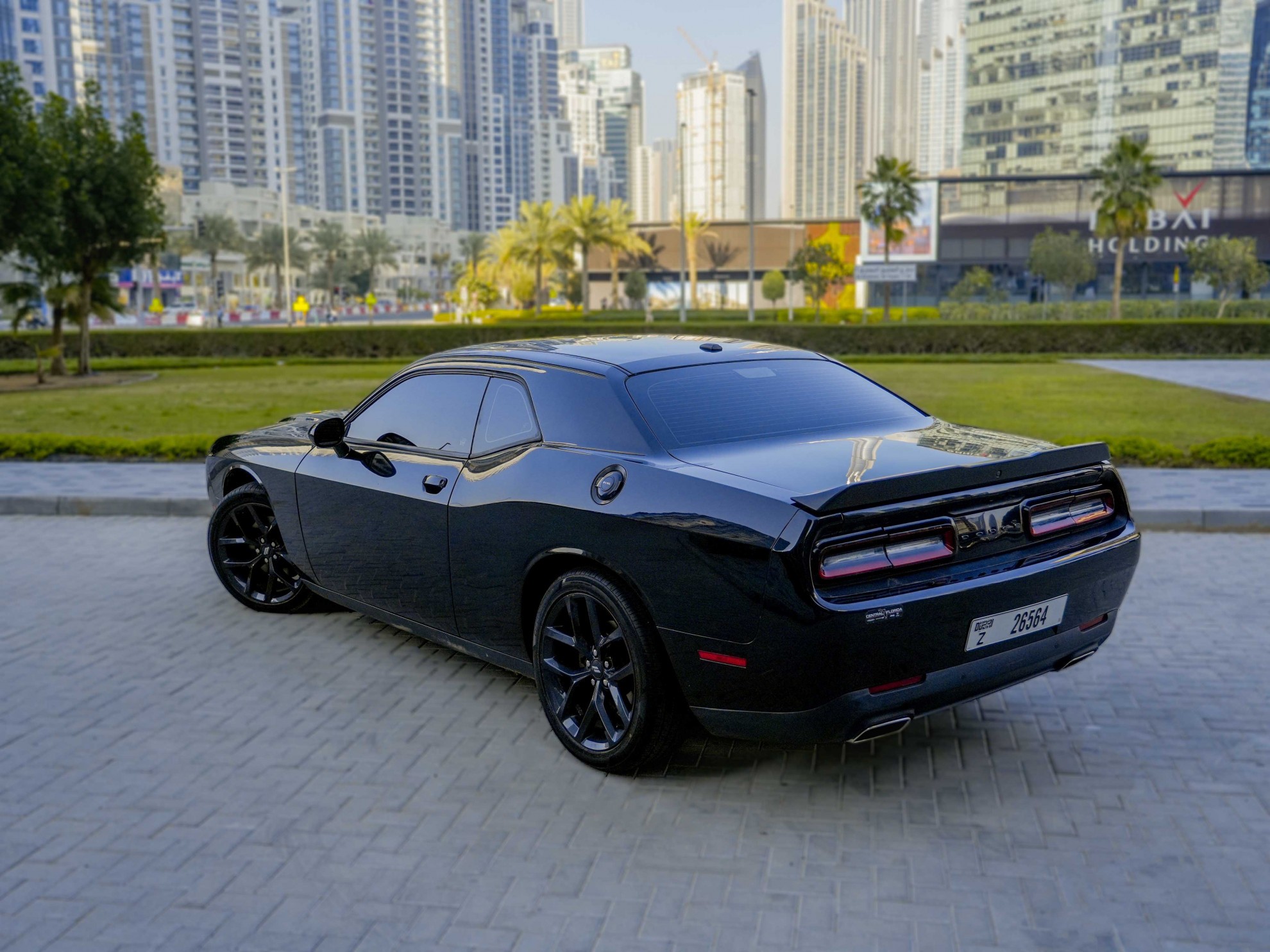 https://www.quickdrive.ae/uploads/2023/02/01/Dodge Challenger V6 2021 (2).jpg